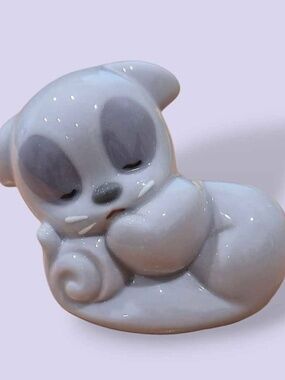 NAO by Lladro Sleeping Purple Squirrel Figurine